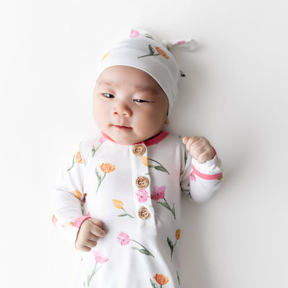 Close up of the Knotted Gown with Hat Set in Tulip on a newborn