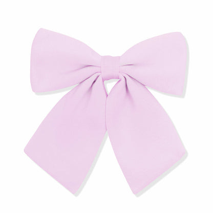 Light purple bow on a white background