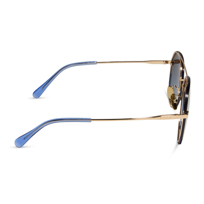 diff eyewear lenox aviator sunglasses with a gold metal frame and blue gradient polarized lenses side view