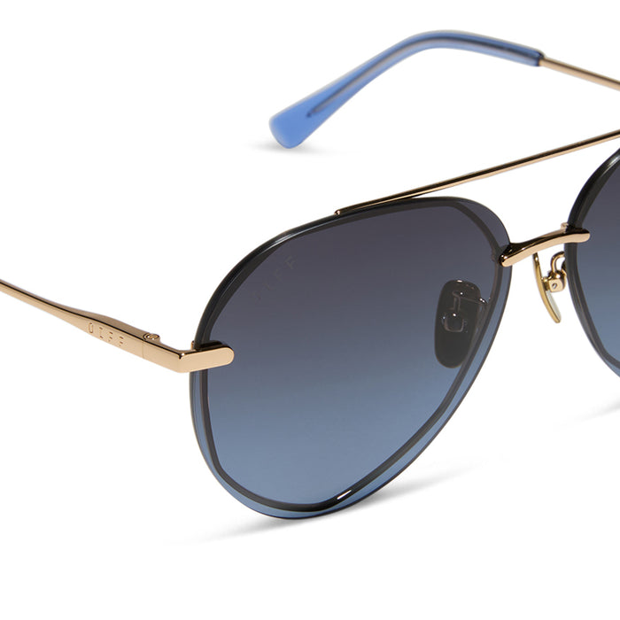diff eyewear lenox aviator sunglasses with a gold metal frame and blue gradient polarized lenses detailed view