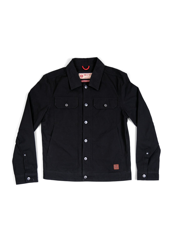 Black denim jacket with button closure, two chest pockets, and a collar, laid flat on a white background.