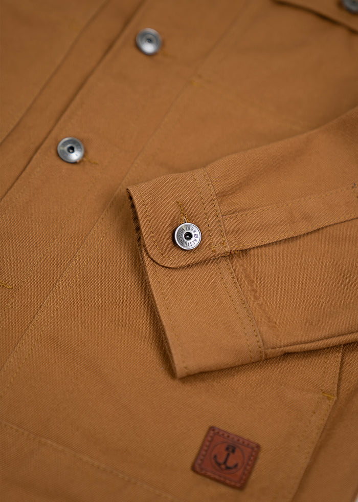 Brown jacket with silver buttons, detailed stitching, and an anchor logo patch on the sleeve. Casual and stylish design.