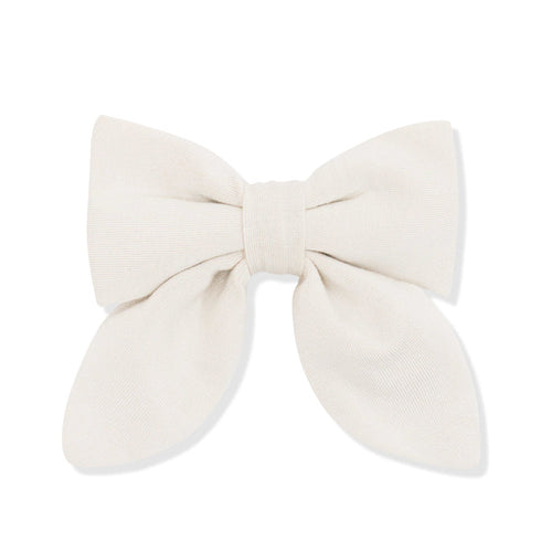 Large cream-colored bow on a white background