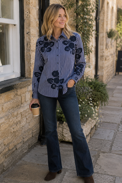 Milano 63-4901-3557 Navy Stripe Floral Appliqué Shirt Blouse worn by a model. MILANO. Shop MILANO at Dotique