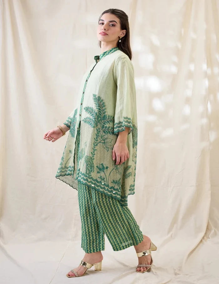 Mint Green Embroidered Kurta Set with Nature-Inspired Motifs and Printed Straight Pants for Women.
