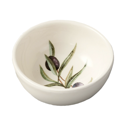 A white ceramic bowl with an olive branch design inside.