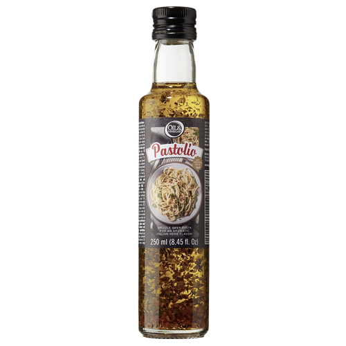 A bottle of Pastolio flavored olive oil with visible suspended particles, indicating a seasoned oil.