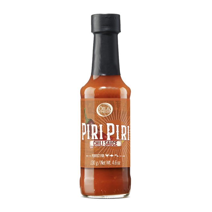 A bottle of Piri Piri chilli sauce with a label showing the product name and weight of 130g.