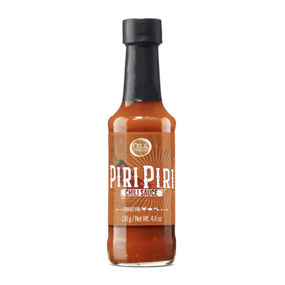 A bottle of Piri Piri chilli sauce with a label showing the product name and weight of 130g.