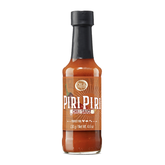 A bottle of Piri Piri chilli sauce with a label showing the product name and weight of 130g.