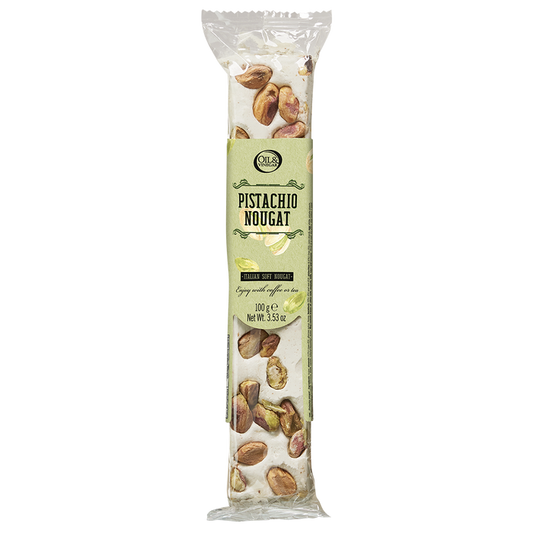 Packaged pistachio nougat snack showing the nuts and text on the wrapper.