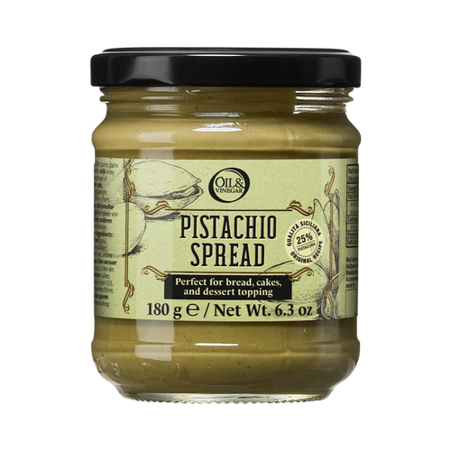A glass jar of Pistachio Spread with a green label, indicating that it is perfect for bread, cakes, and dessert toppings.