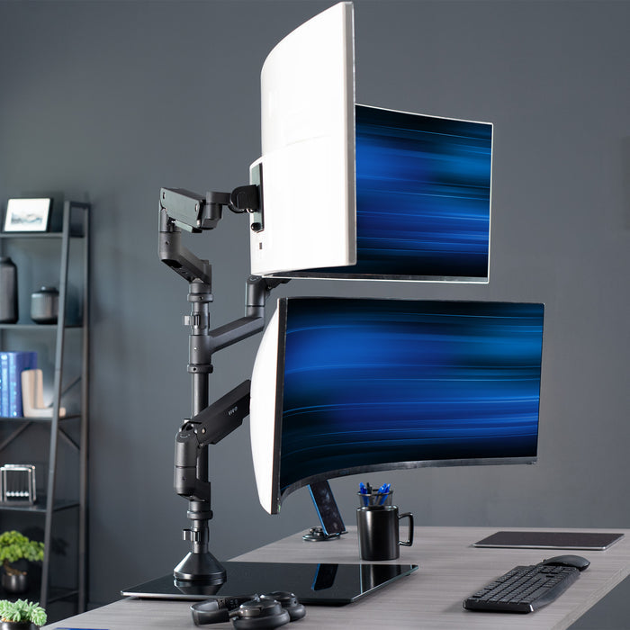 Pneumatic Arm Triple Ultrawide Monitor Extra Tall Desk Stand on desk in office space holding three ultrawide monitors.