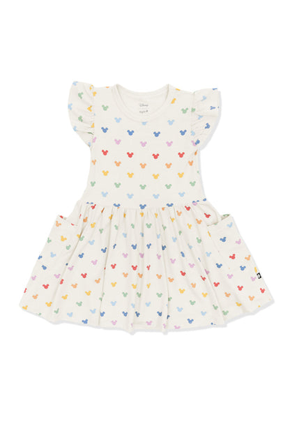 Pocket Dress with Pastel Mickey Mouse pattern on an oat background