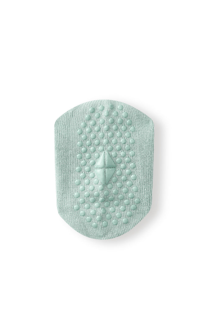 Bottom of Kyte sock with grips.