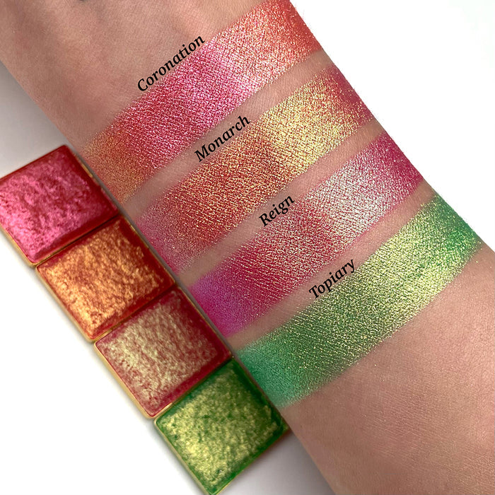 Top angled arm swatches on fair skin tone of Reign Vibrant Multichrome Eyeshadow shifts compared to Coronation, Monarch and Topiary