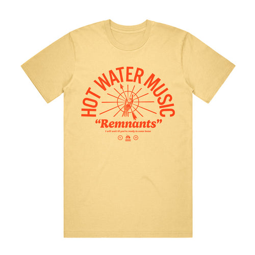 Butter colored T shirt. The Text "HOT WATER MUSIC" is printed in an arch in the center of the shirt. There is a circle Under the arch with many lines coming from the center. There is a hand in the center of the circle holding an arrow. The text "Remnants" is printed under the circle and arch. The hot water music logo is also printed underneath the text. The whole design is a tomato red color.
