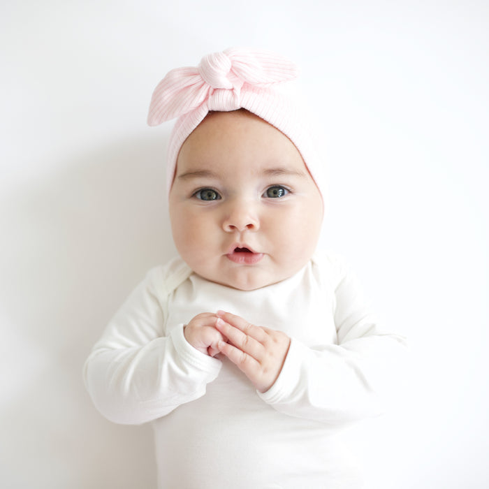 Baby wearing Ribbed Headwrap in Sakura
