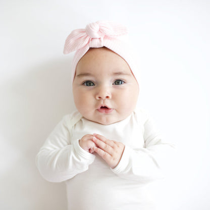 Baby wearing Ribbed Headwrap in Sakura