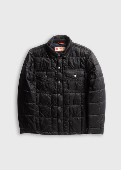 Black quilted jacket with button closure and two chest pockets, displayed on a light gray background.
