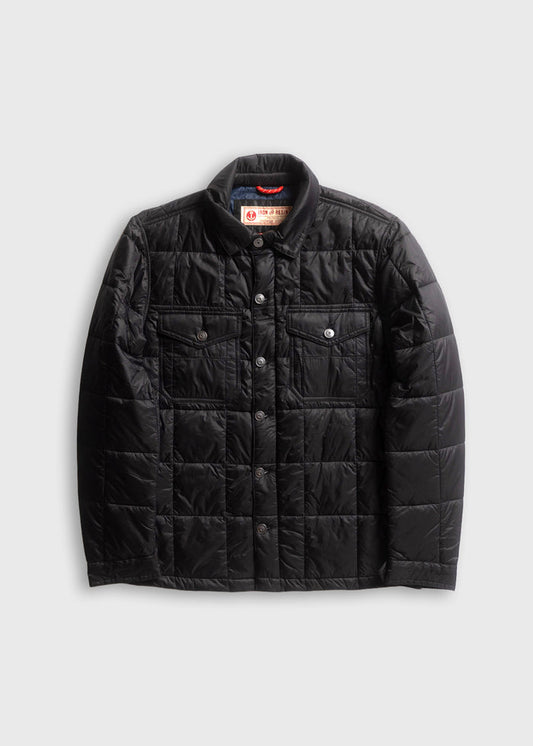 Black quilted jacket with button closure and two chest pockets, displayed on a light gray background.