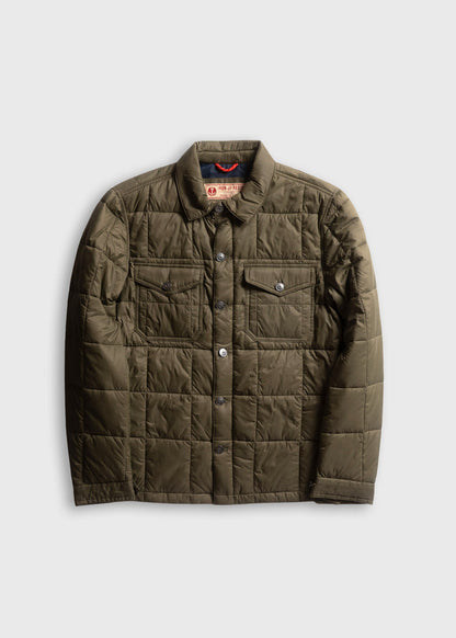 Olive quilted jacket with button closure, two chest pockets, and a collar, displayed on a plain white background.