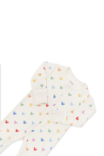 Top part of Romper in Pastel Mickey Mouse pattern on an oat background