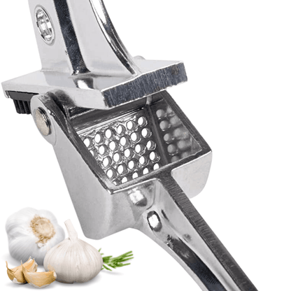 Royal Industries 7 inch Aluminum Garlic Press  This garlic press features pressing nubs that force the garlic through a stainless steel blade. It is extremely easy cleaning and won't leave your hands smelling like garlic all day-ROY GP Hannah's Variety Store