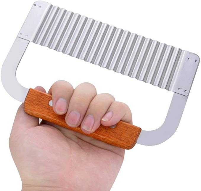 Royal Industries Stainless Steel Serrator 7 inch with Wood Handle This kitchen tool features a highly durable construction which is perfect for commercial use. ROY GR 230 Hannah's Variety Store