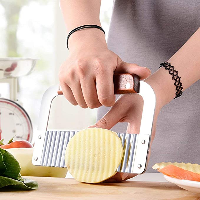 Royal Industries Stainless Steel Serrator 7 inch with Wood Handle This kitchen tool features a highly durable construction which is perfect for commercial use. ROY GR 230 Hannah's Variety Store