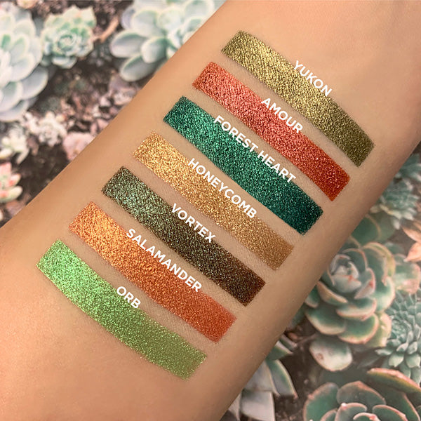 Collage of arm swatches on fair skin tone of Mojave Bundle including Yukon, Amour, Forest Heart, Honeycomb, Vortex, Salamander, Orb