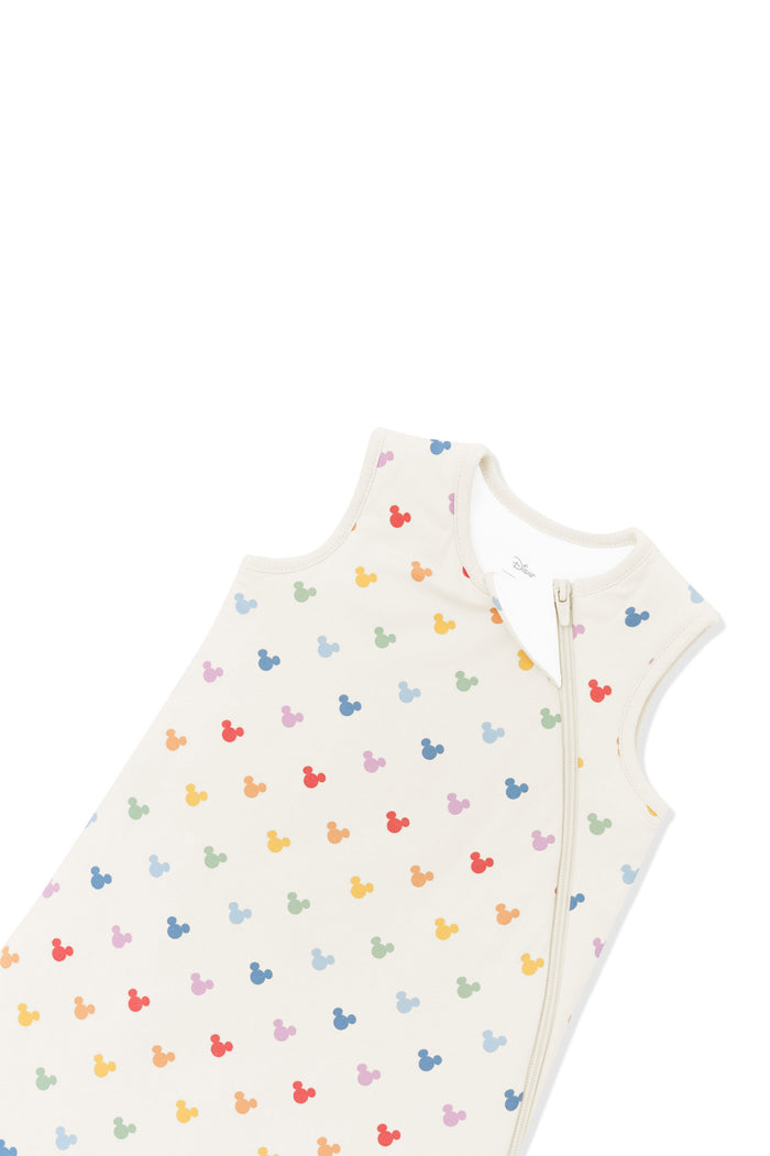 Zipper of Sleep Bag in Pastel Mickey Mouse pattern on an oat background