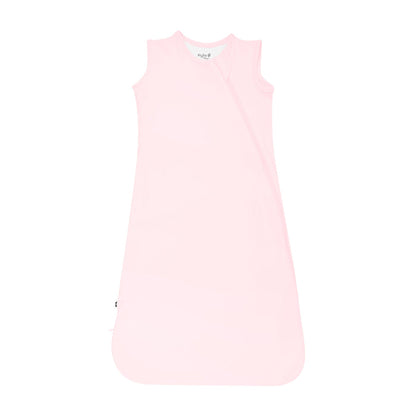 Flat lay photo of the Kyte Baby Sleep Bag in Sakura 0.5