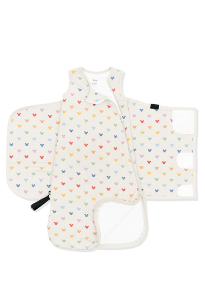 Zipper of Sleep Bag Swaddler in Pastel Mickey Mouse pattern on an oat background