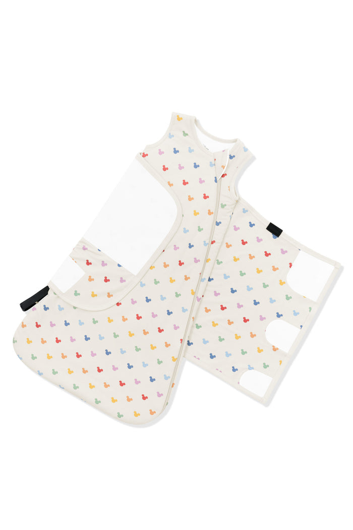 Adjustable velcro swaddle wrap shown on an unswaddled Sleep Bag Swaddler in Pastel Mickey Mouse 1.0