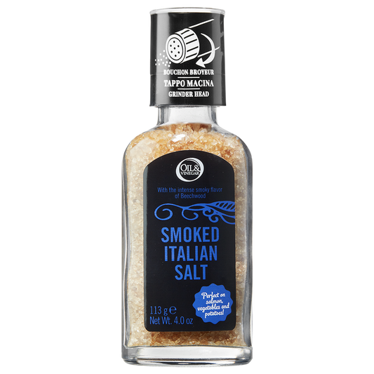 A glass bottle of smoked Italian salt with a grinder cap, labeled and including product information.