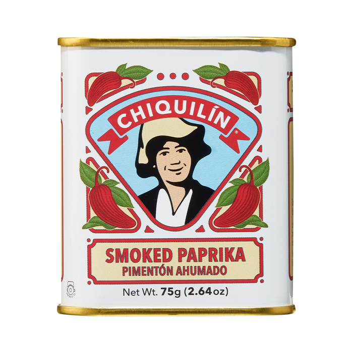 A can of Chiquilin Smoked Paprika with a graphic of a man and paprika peppers on the label, indicating the product is a spice.