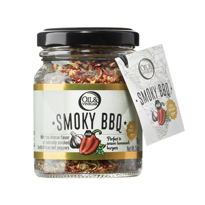A jar of Smoky BBQ herb mix with a label showing the product name and a picture of a pepper, indicating the flavor. A card next to the jar displays additional information.