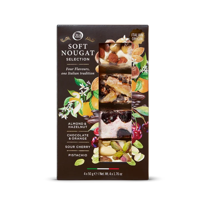 Box of soft nougat selection with various flavors on a white background