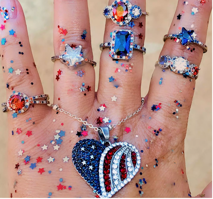 fairybath_jewel_child UGC image of hand with America collection rings