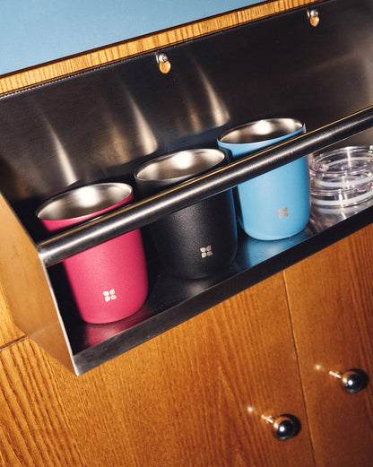 Steel Cup Set on stainless rack, featuring insulated cups and lid.