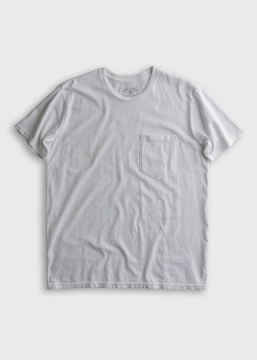White T-shirt with a chest pocket on a plain background, showcasing simple design and casual style.
