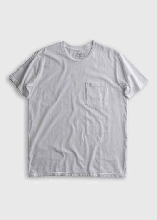 White T-shirt with a chest pocket on a plain background, showcasing simple design and casual style.
