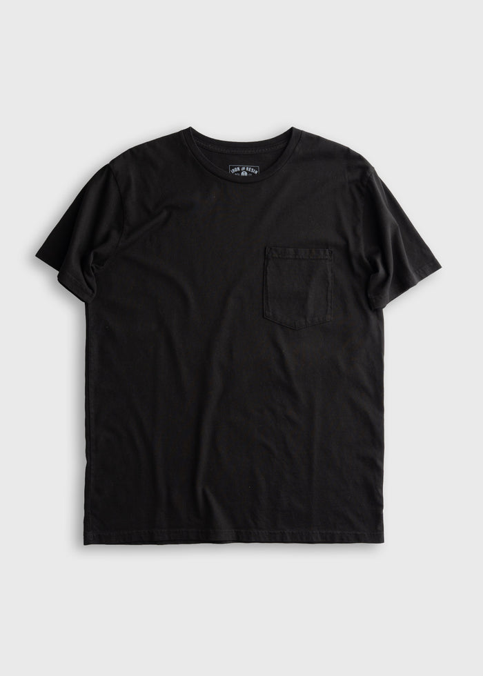 Black T-shirt with a chest pocket, displayed on a light gray background. Simple and casual design, perfect for everyday wear.