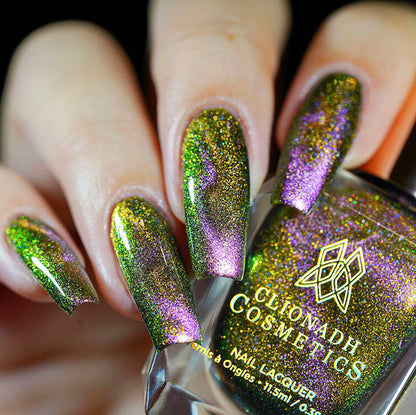 Close up of nails done with Synesthesia Nail Lacquer featuring a design to show off the magnetic effect on fair skin tone