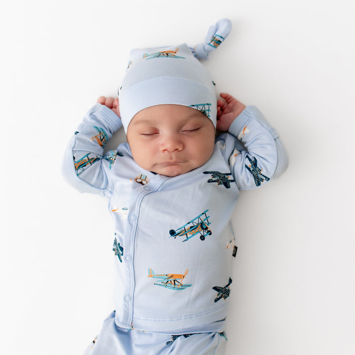 Close up of sleeping newborn wearing the Take Me Home Set with Cap in Take Off