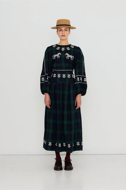 Tiny Big Sister Embroidered Check Puff Sleeves Blouse AW26-754 on model Shop Tiny Big Sister at Dotique