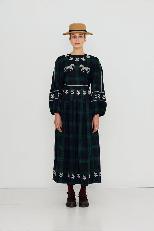 Tiny Big Sister Embroidered Check Puff Sleeves Blouse AW26-754 on model Shop Tiny Big Sister at Dotique