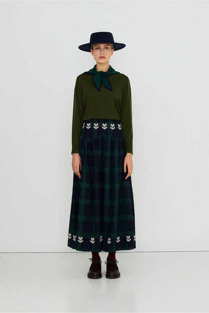 Tiny Big Sister Embroidered Check Skirt AW26-755 on model Shop Tiny Big Sister at Dotique