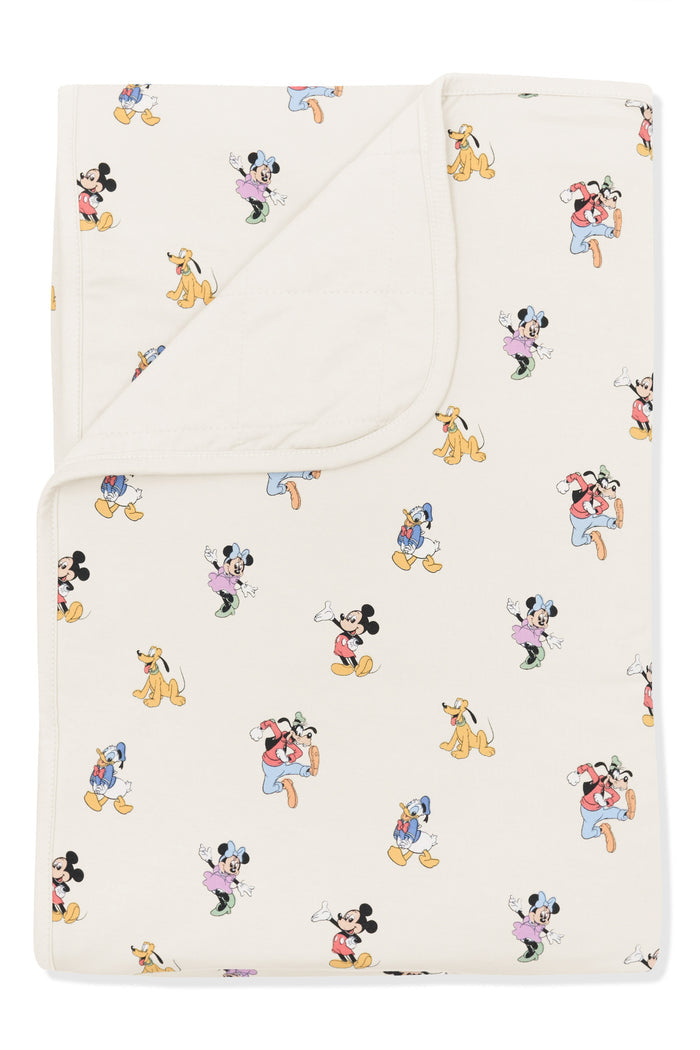 Toddler Blanket with Mickey Mouse and Friends print on an oat background